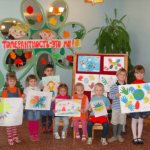 Children with posters and drawings on tolerance